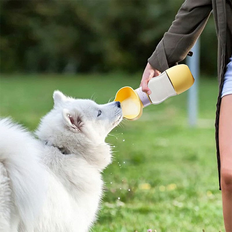 "Pet Hydration On-the-Go: 550ML Leak-Proof Dog Cat Drink Bottle with 200ml Dog Food Cup"